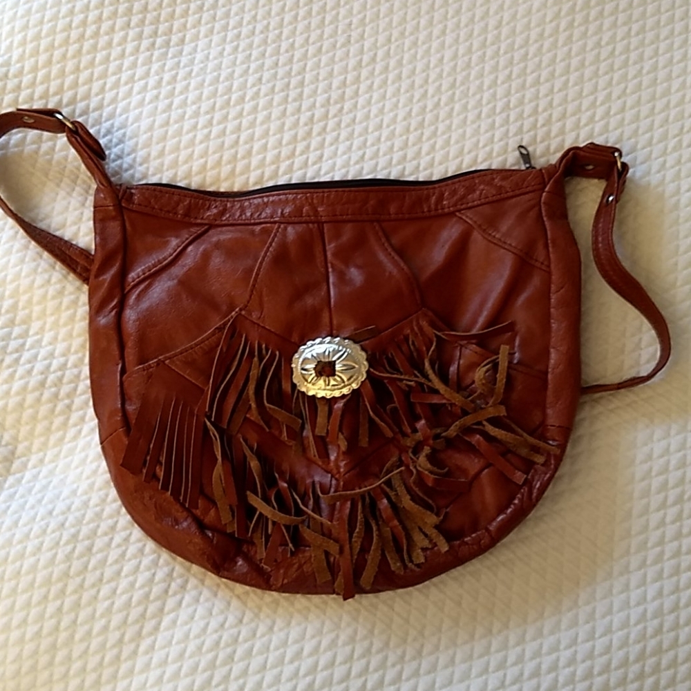 Saddle brown leather purse.